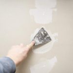 Image of Drywall repair plastering closeup