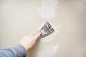 Image of Drywall repair plastering closeup